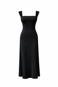 Elegant black evening dress with square neckline and wide straps, perfect for formal occasions in Qatar.