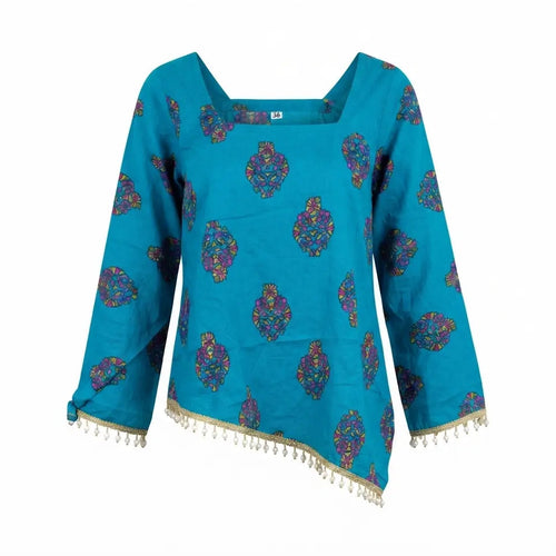 A turquoise blue long-sleeve top with a square neckline, decorated with colorful paisley-like motifs and a gold tassel fringe along the hem and cuffs, shown against a plain white background.
