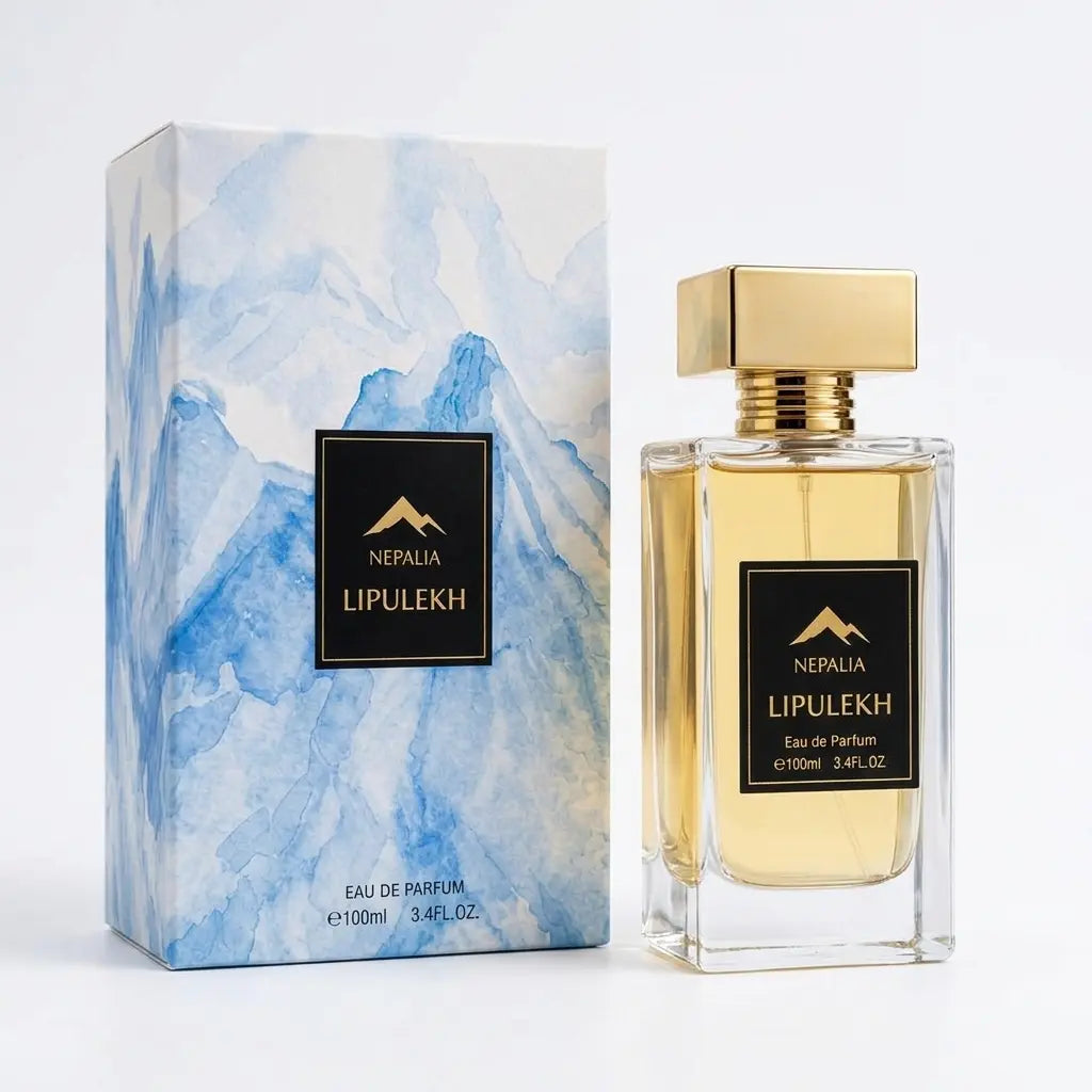 Nepal Lipulekh Eau de Parfum bottle with a gold cap next to its blue watercolor mountain-patterned box, on a white background.