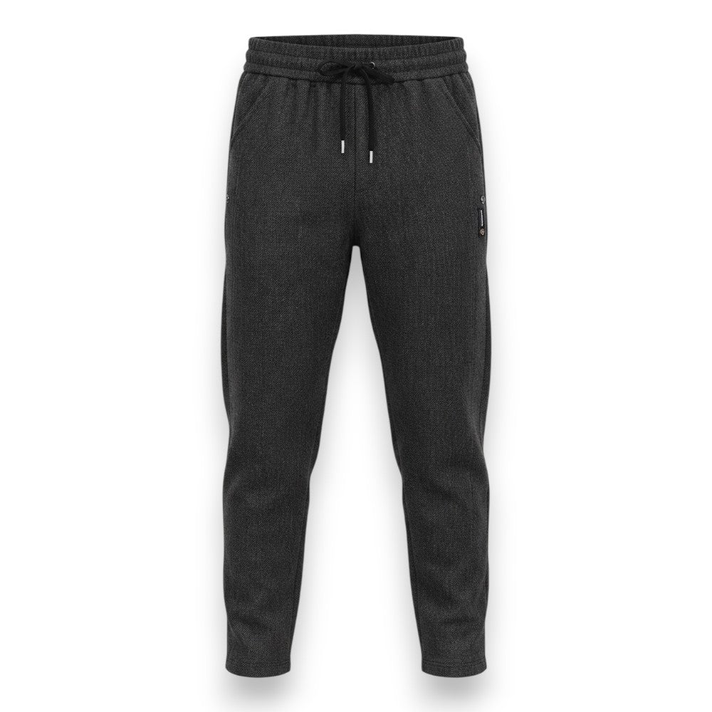 Dark gray ribbed knit jogger pants with an elastic drawstring waist and side pocket, shown against a plain white background.