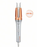 Hair straightener with rose gold and silver design on a white background