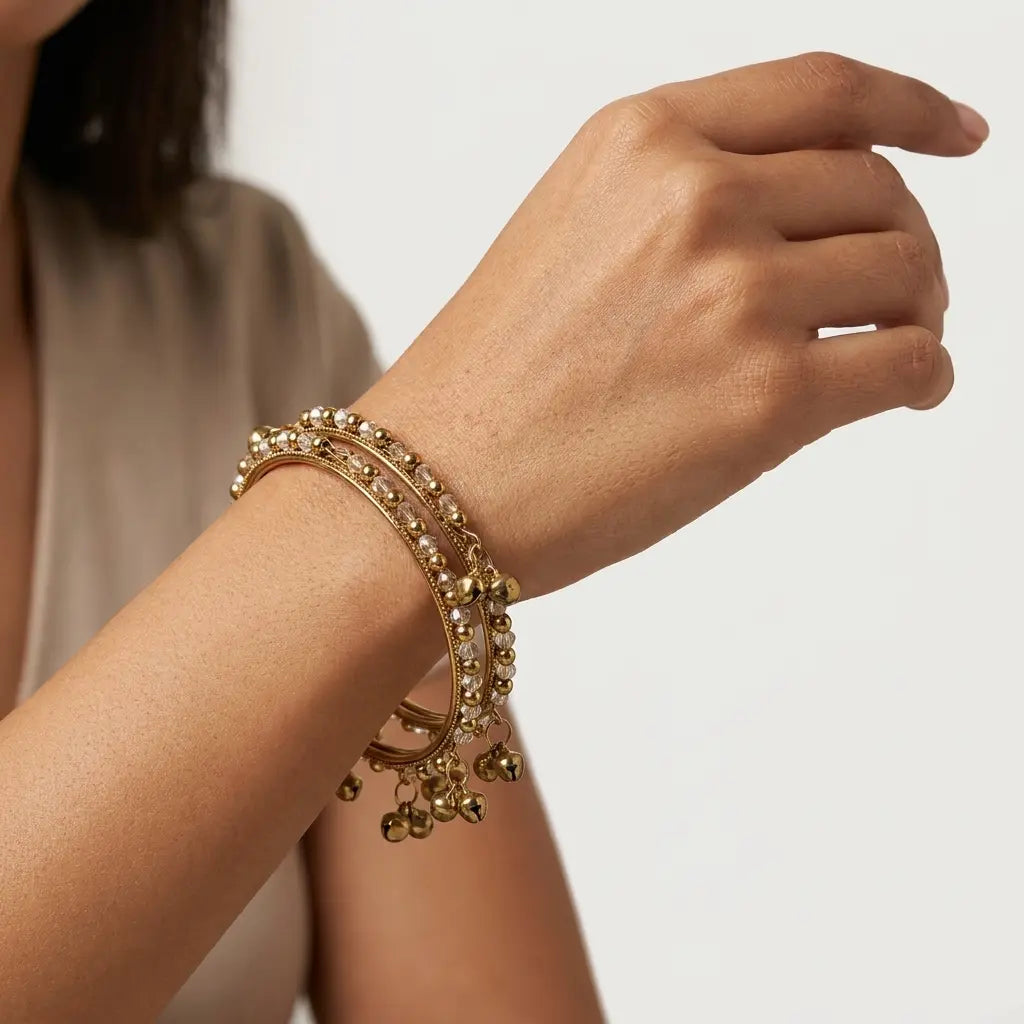 Elegant Gold-Tone Ghungroo Bangles with Crystal Accents