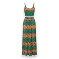 A two-piece sleeveless maxi dress set with a cropped tank top and a matching long skirt, featuring a green, gold, and brown abstract pattern, shown against a plain white background.